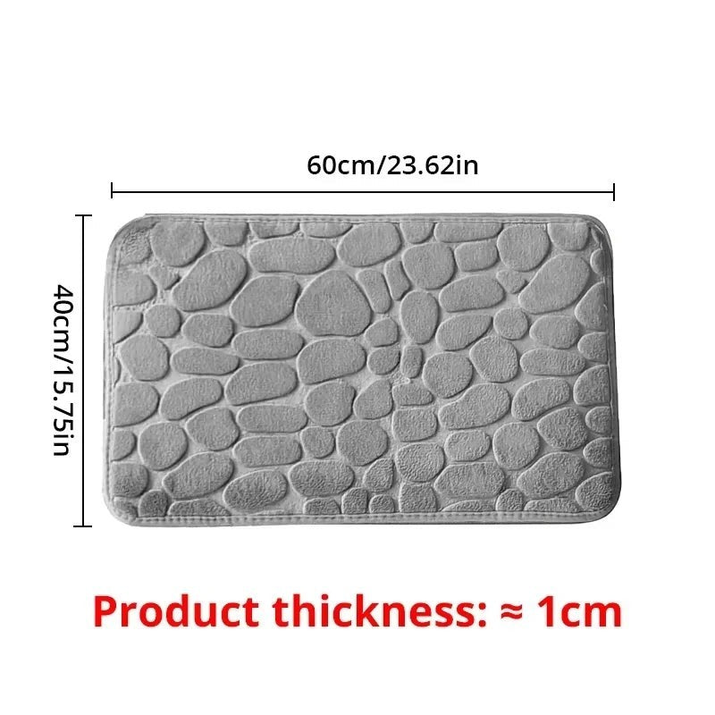 Alfombrilla de baño gris de Variedad Online con diseño de guijarros, 60x40cm, suave y absorbente.