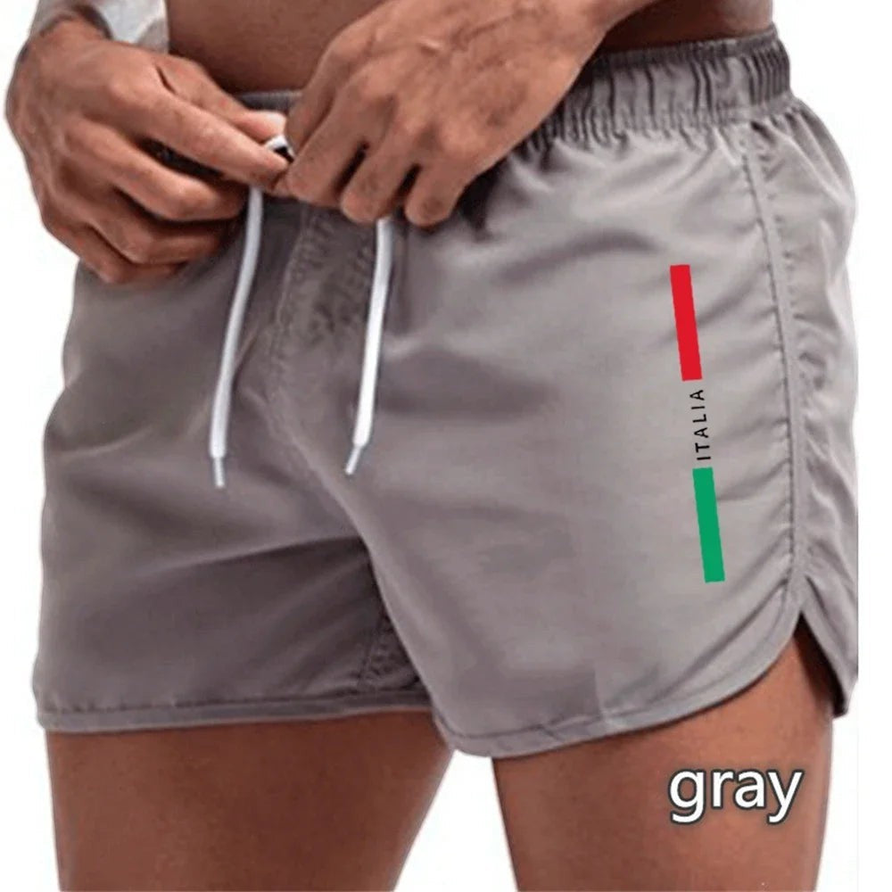 Bañadores grises de secado rápido para hombre de Variedad Online con cordón ajustable y detalle de bandera italiana.