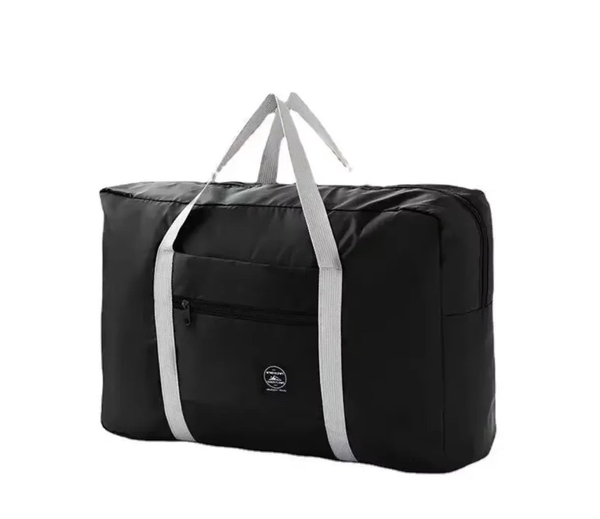 Bolsa de viaje plegable negra de nailon resistente al agua de Variedad Online con asas grises y bolsillo frontal con cremallera.